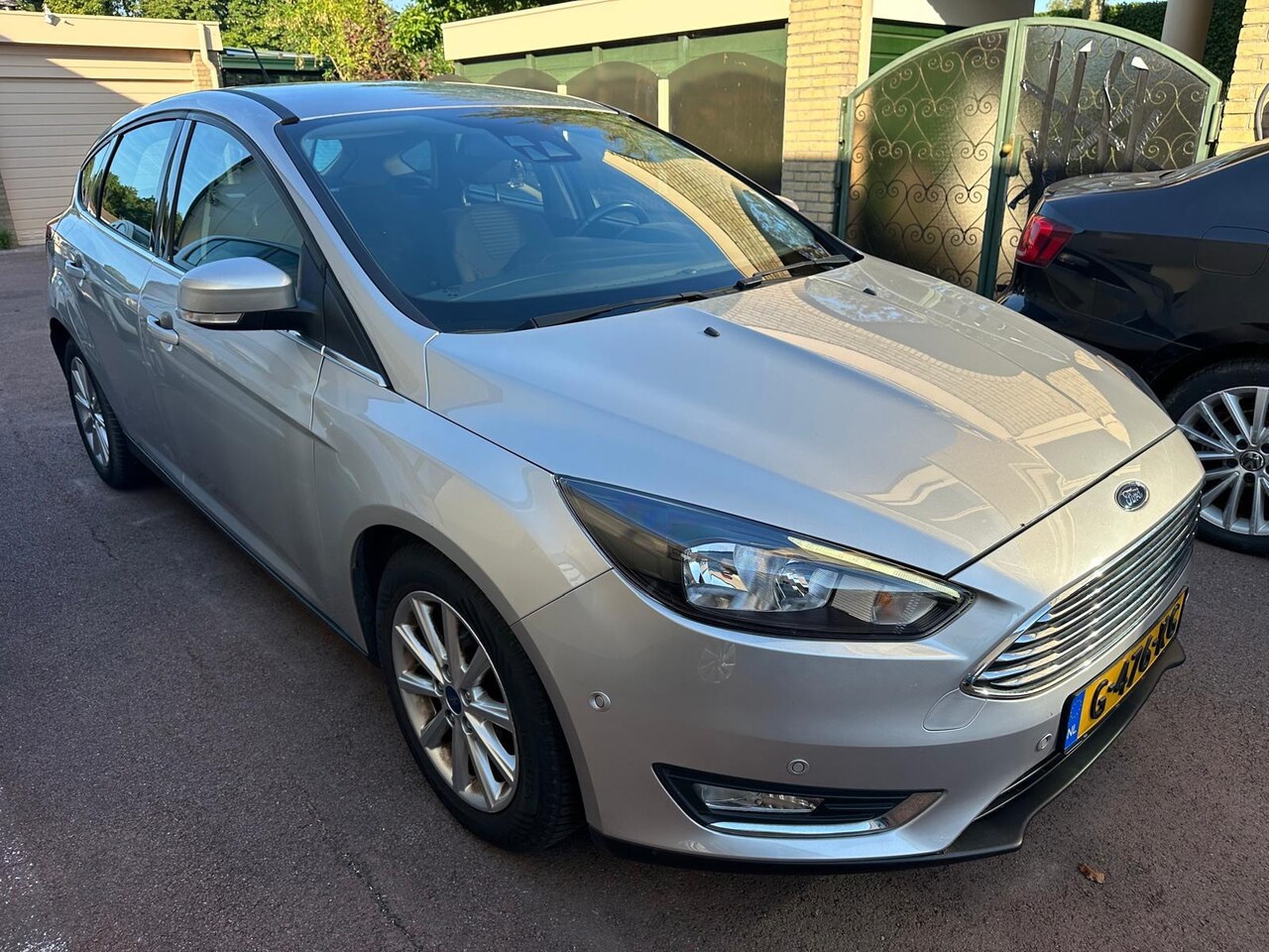 Ford Focus - 1.0 Titanium Navigatie PDC - AutoWereld.nl
