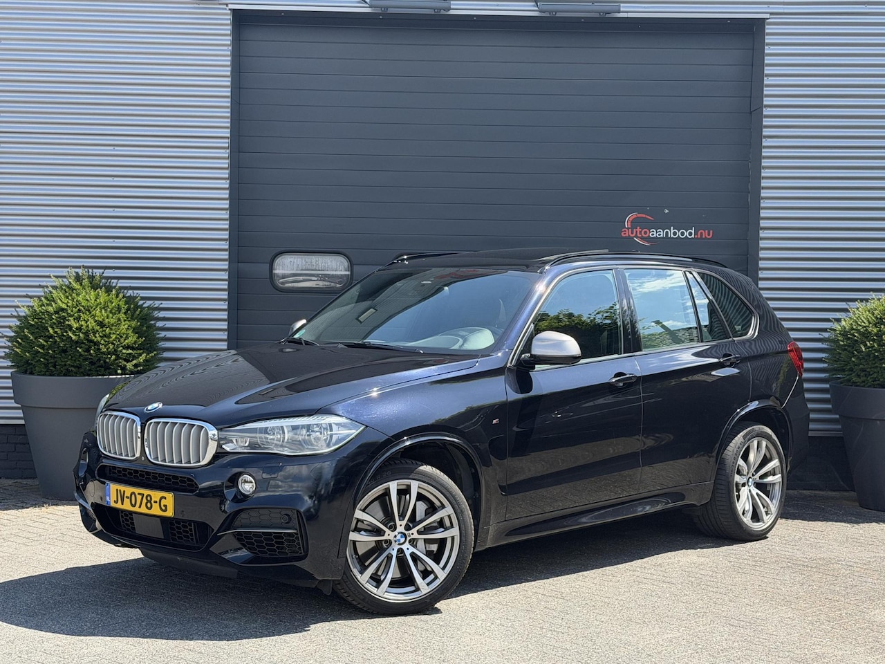 BMW X5 - M50d | Panoramadak | 360* Camera | TV Schermen | Harmon Kardon | Elektrischte Trekhaak | - AutoWereld.nl