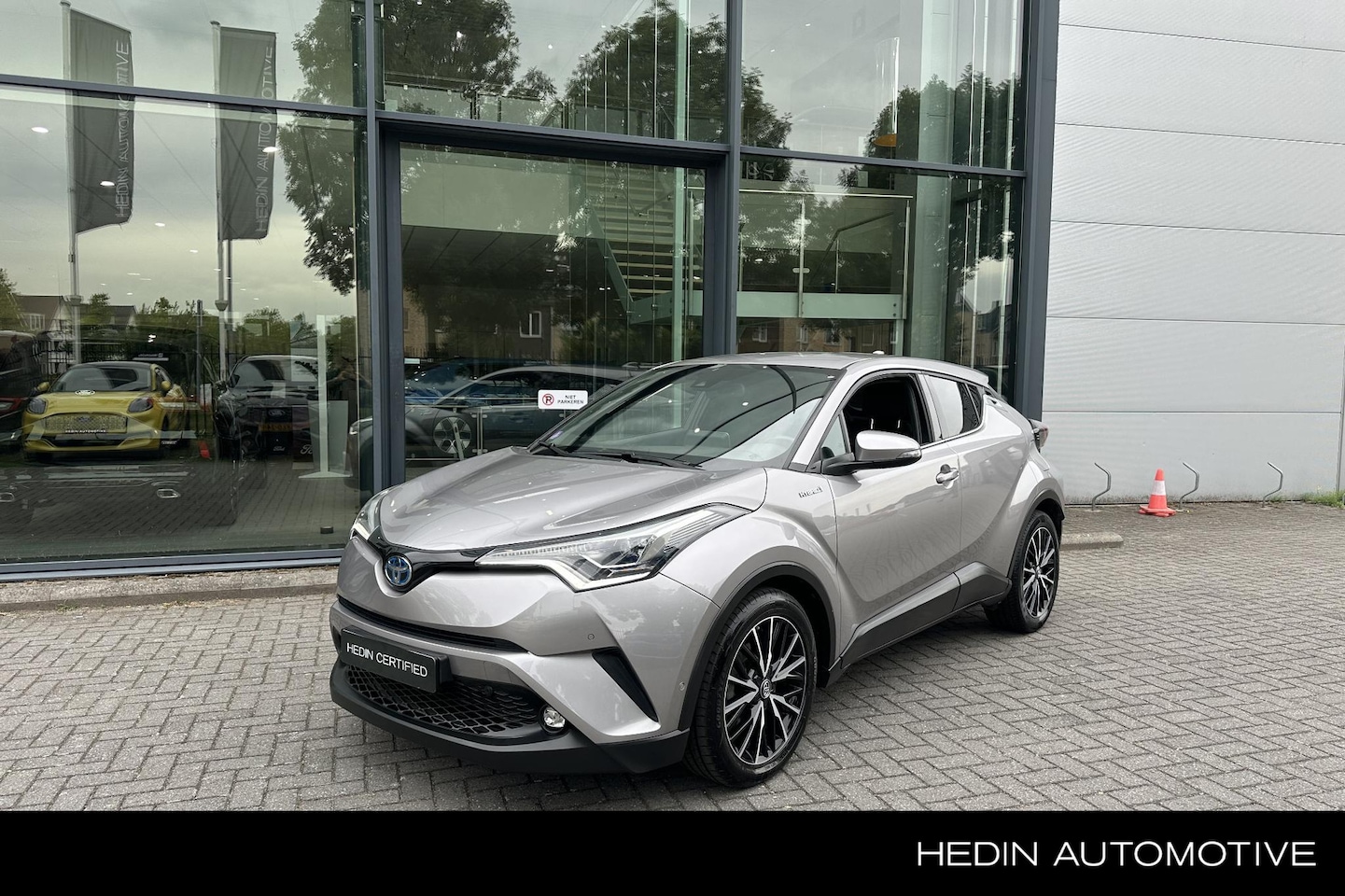 Toyota C-HR - 1.8 Hybrid Executive | Trekhaak | Navigatie | Camera | BISS - AutoWereld.nl
