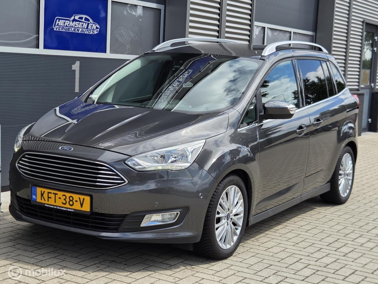 Ford Grand C-Max - 1.0 EcoBoost 125pk Titanium 7 persoons - AutoWereld.nl