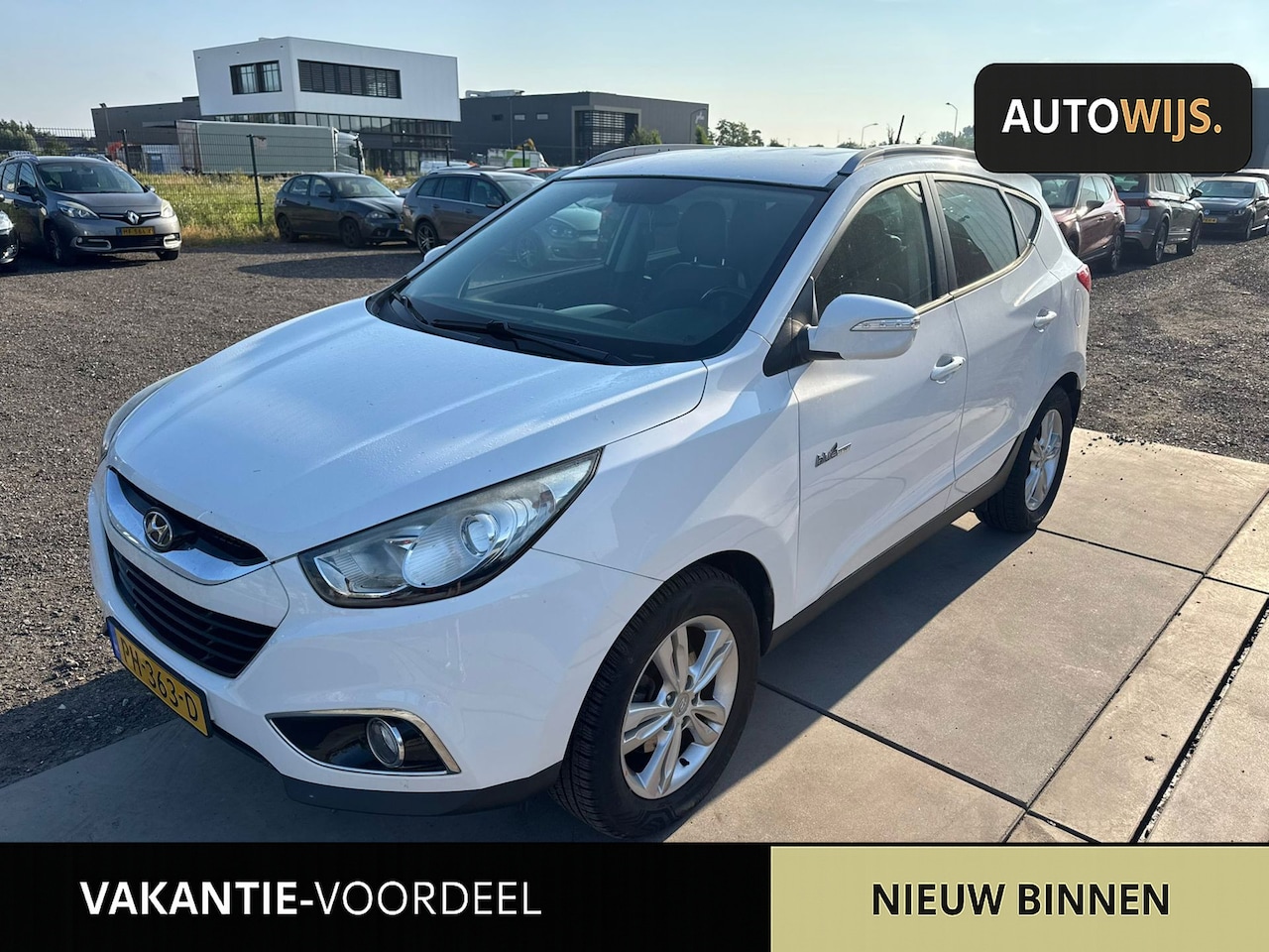 Hyundai ix35 - 1.6i GDI Business Edition|CAMERA|NAVI|HALF LEER|CLIMA|GOED ONDERHOUDEN - AutoWereld.nl