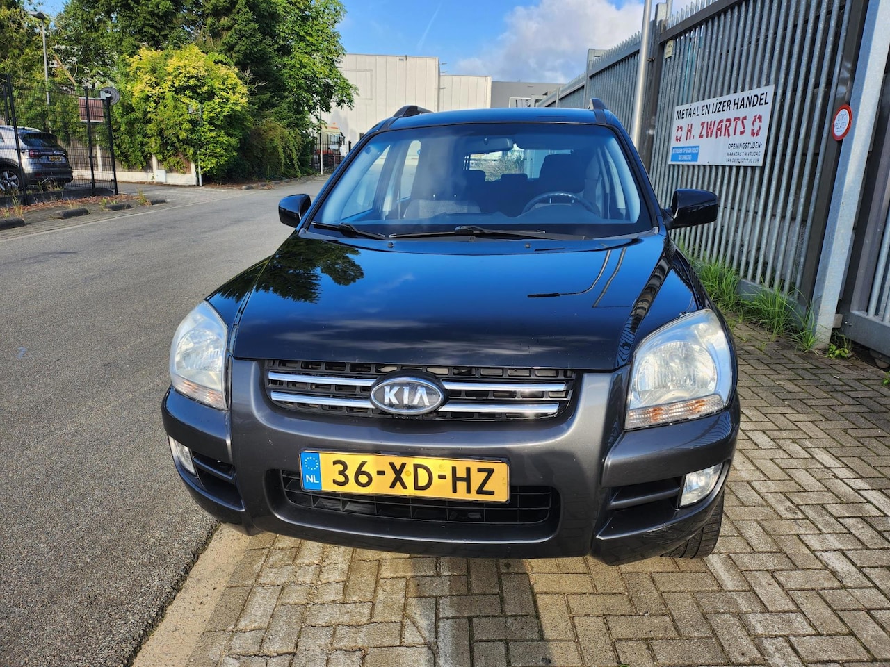Kia Sportage - 2.0 CVVT Comfort 2.0 CVVT Comfort - AutoWereld.nl