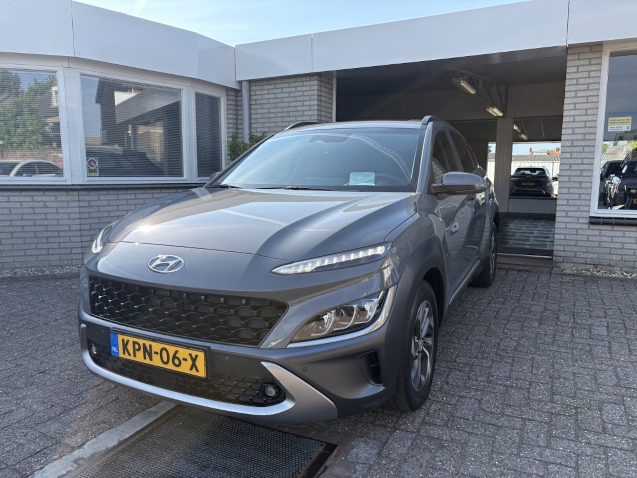 Hyundai Kona - 1.6 GDI HEV Fash. AUT. Vol leder - AutoWereld.nl