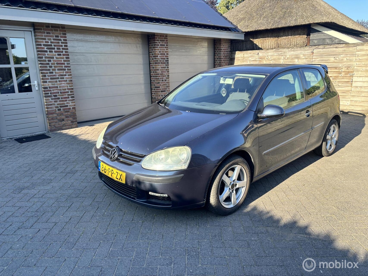 Volkswagen Golf - 1.6 FSI Sportline 1.6 FSI Sportline - AutoWereld.nl
