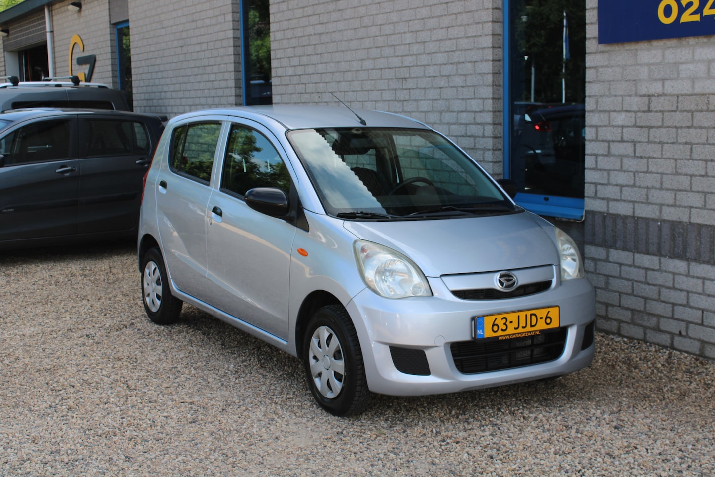 Daihatsu Cuore - 1.0 Trend 5DRS Automaat - AutoWereld.nl