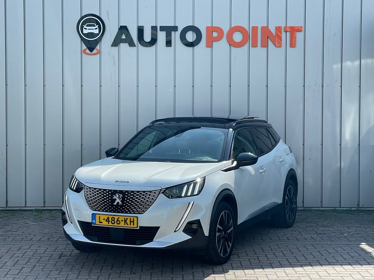 Peugeot e-2008 - EV GT Pack 50 kWh PANO CAMERA SOH 91% FASE 3 DEALER OND EERSTE EIG - AutoWereld.nl