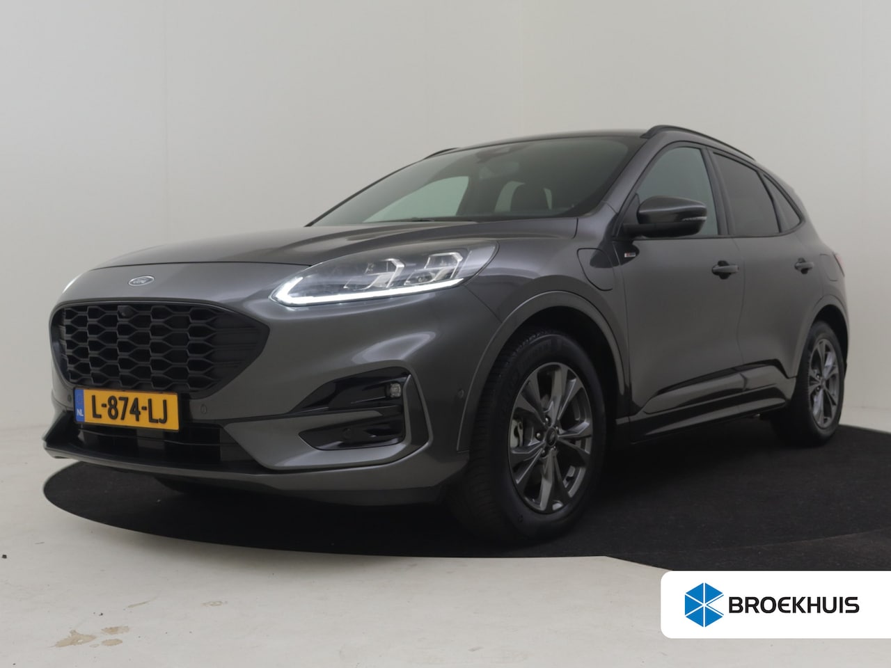 Ford Kuga - 2.5 PHEV ST-Line X 225PK AUTO | Achteruitrijcamera | Camera voor | B&O Audio | SOH 83% | P - AutoWereld.nl