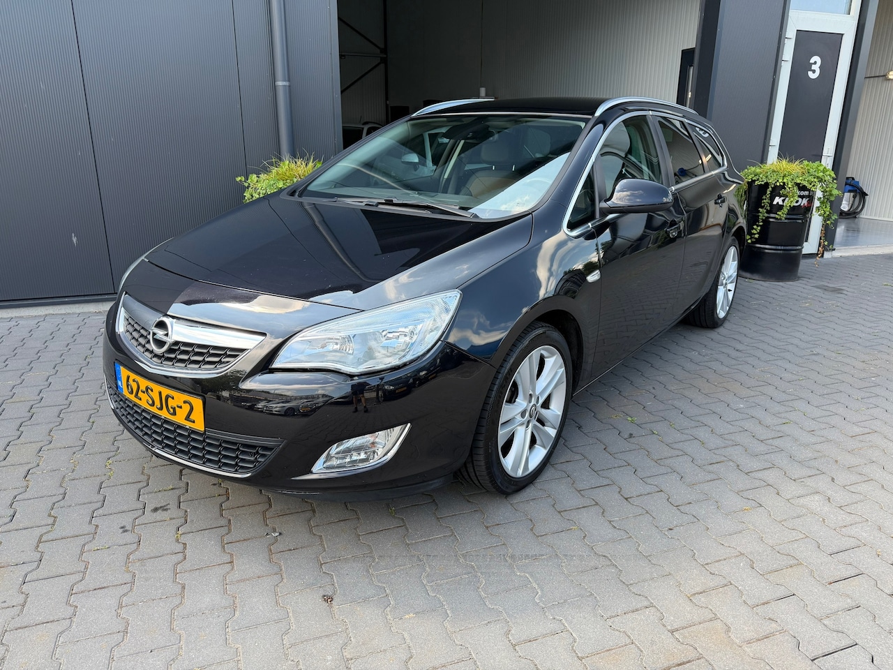 Opel Astra Sports Tourer - 1.4 Turbo Cosmo 1.4 Turbo Cosmo - AutoWereld.nl