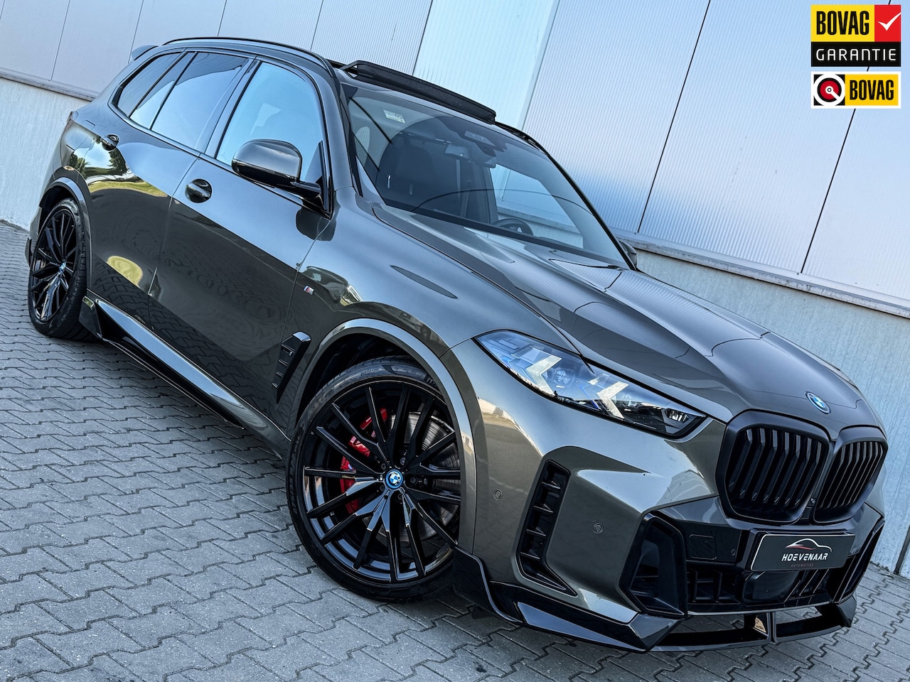 BMW X5 - XDrive50e 490Pk M-sport Perfomance Skylounche Carbon H&K Full - AutoWereld.nl