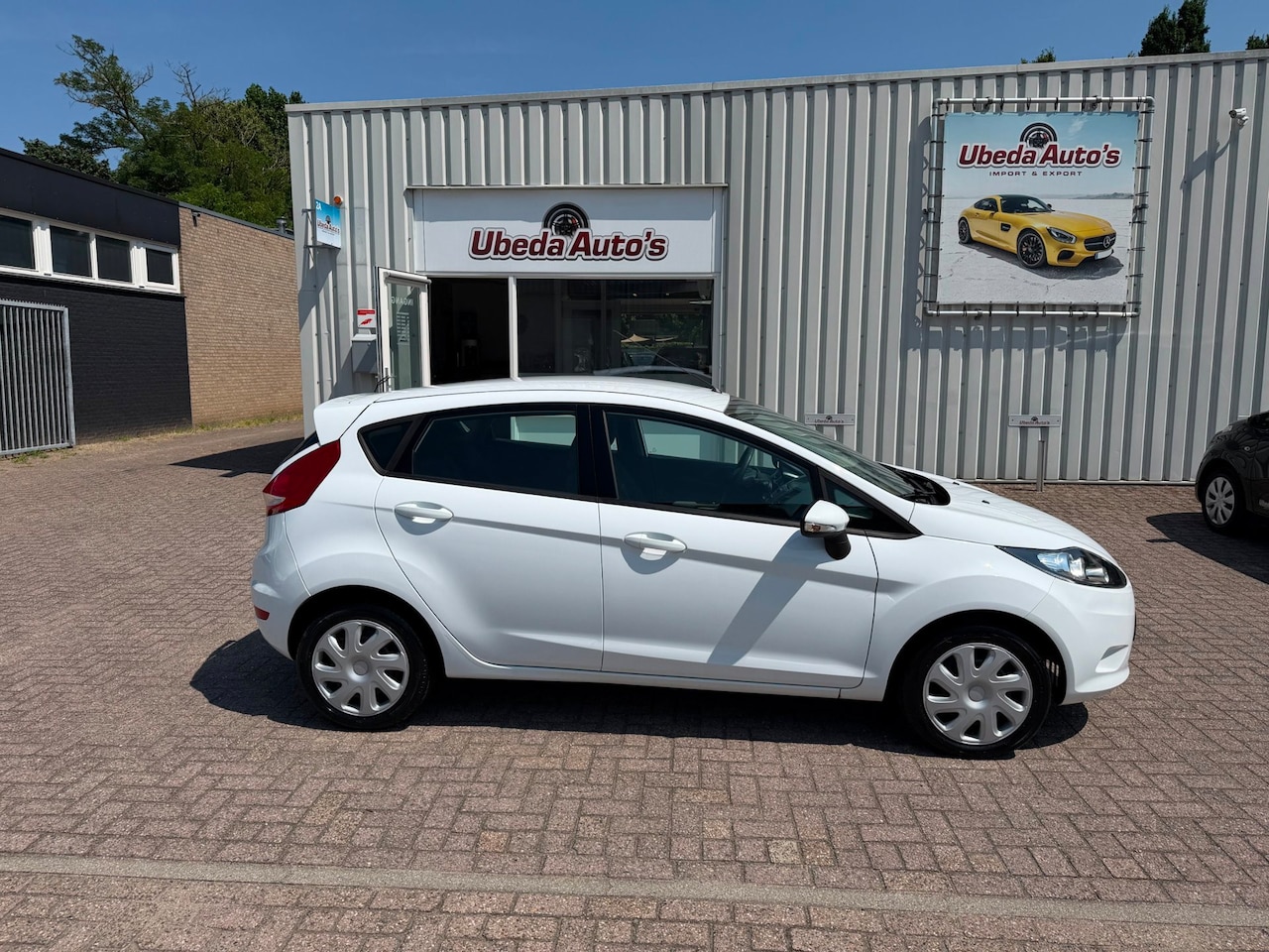 Ford Fiesta - 1.25 Limited NL AUTO KM 72889 NAP 5 DEURS AIRCO 4750E - AutoWereld.nl