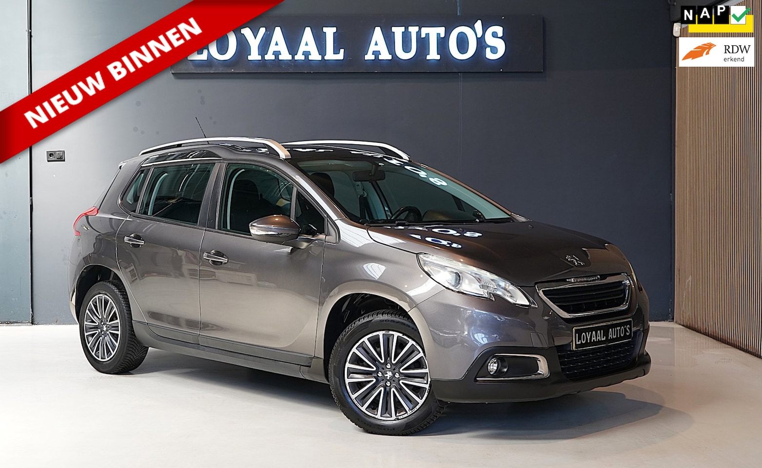 Peugeot 2008 - 1.2 PureTech Active | AUTOMAAT | CRUISE | PDC | GLAZEN DAK | NAVI | APK | NAP. - AutoWereld.nl