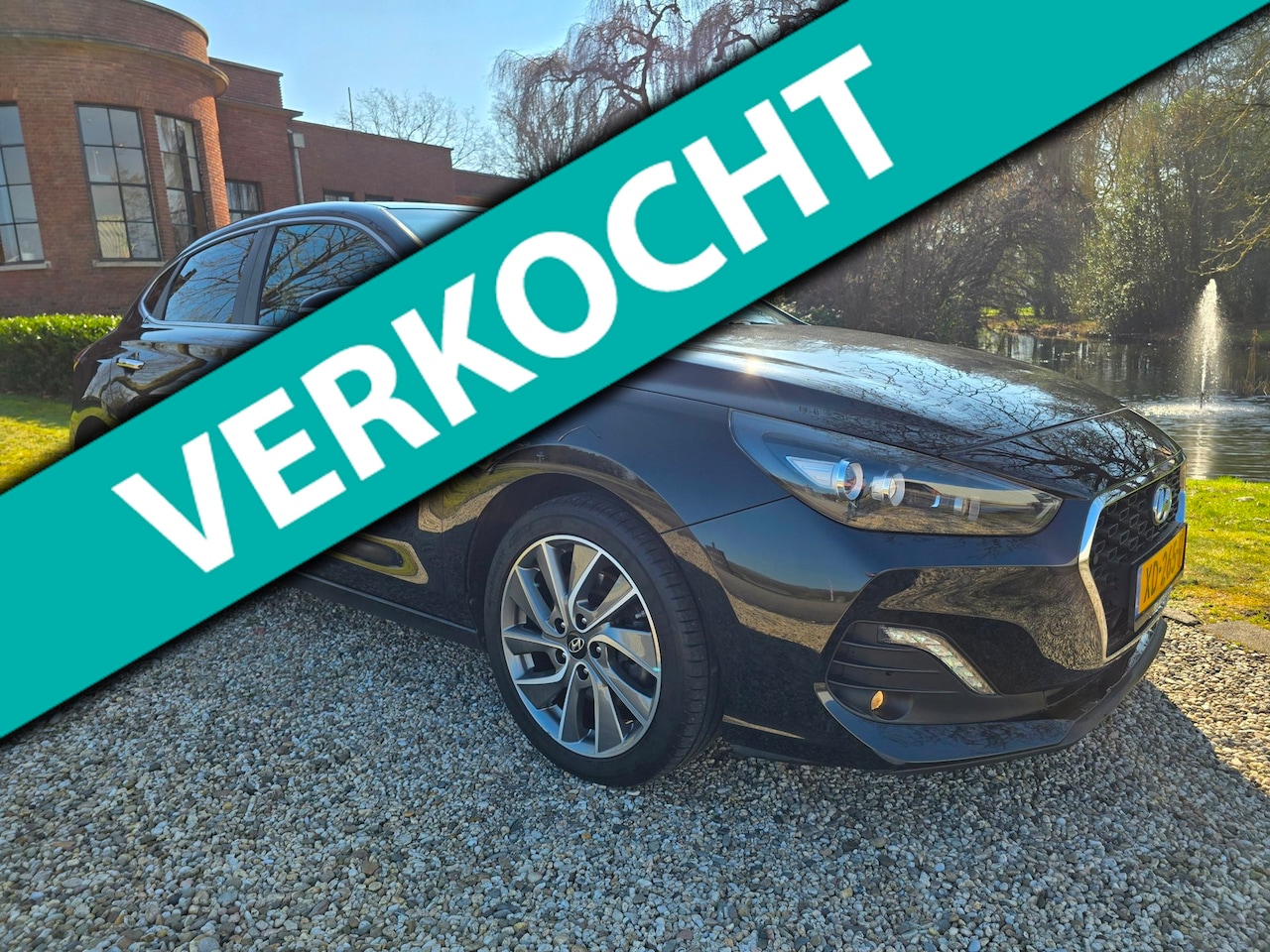 Hyundai i30 Fastback - 1.4 T-GDI Premium NAVI/airco/TREKHAAK - AutoWereld.nl