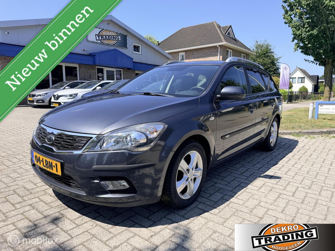 Kia Cee'd Sporty Wagon - 1.4 CVVT X-ecutive 1e Eigenaar airco cruise trekhaak - AutoWereld.nl