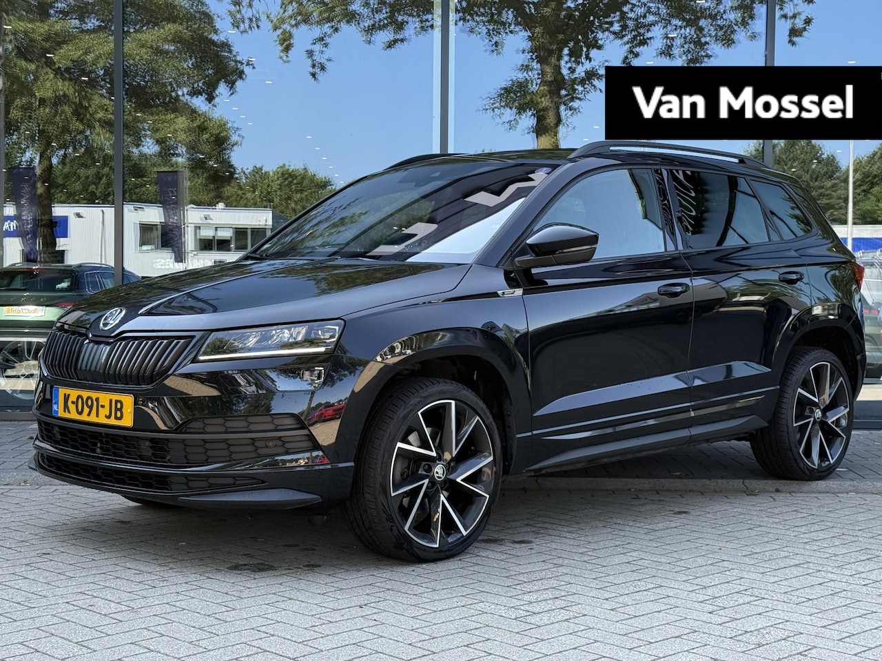 Skoda Karoq - 1.5 TSI ACT Sportline Business | ACHTERUITRIJCAMERA | - AutoWereld.nl