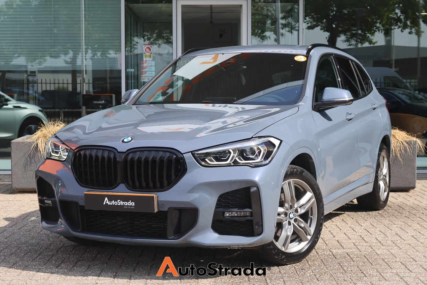 BMW X1 - (f48) sDrive18i M-Sport | Stormbay | LED | Navigatie | Cruise | Climate | Sfeerverlichting - AutoWereld.nl