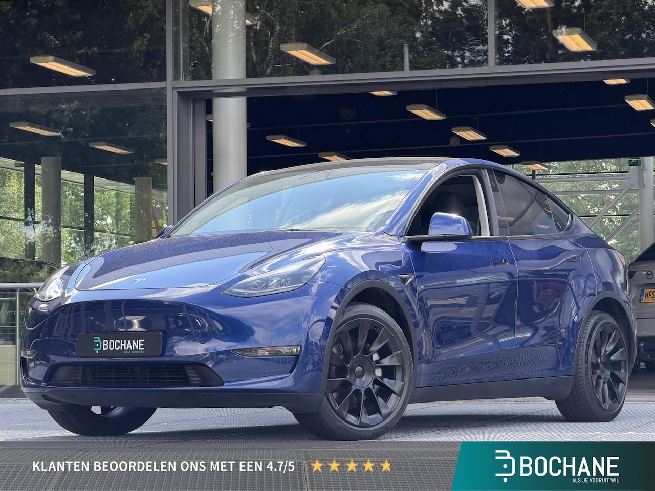 Tesla Model Y - Long Range AWD 75 kWh 351PK | SOH 89.9% | Panoramadak | Memory | Stoelverwarming | Trekhaa - AutoWereld.nl