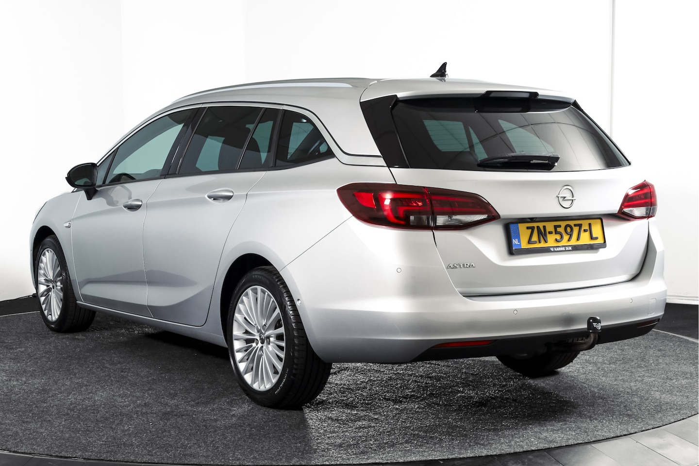Opel Astra Sports Tourer - 1.4 Turbo Innovation | Cruise | PDC | Camera | NAV + App.Connect | Auto.Airco | Afn. Trekh - AutoWereld.nl