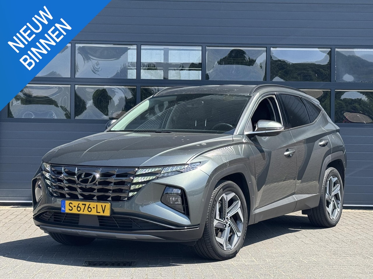 Hyundai Tucson - 1.6 T-GDI HEV PREMIUM I AUTOMAAT I 360 CAMERA I APPLE CARPLAY I CLIMATE CONTROL - AutoWereld.nl