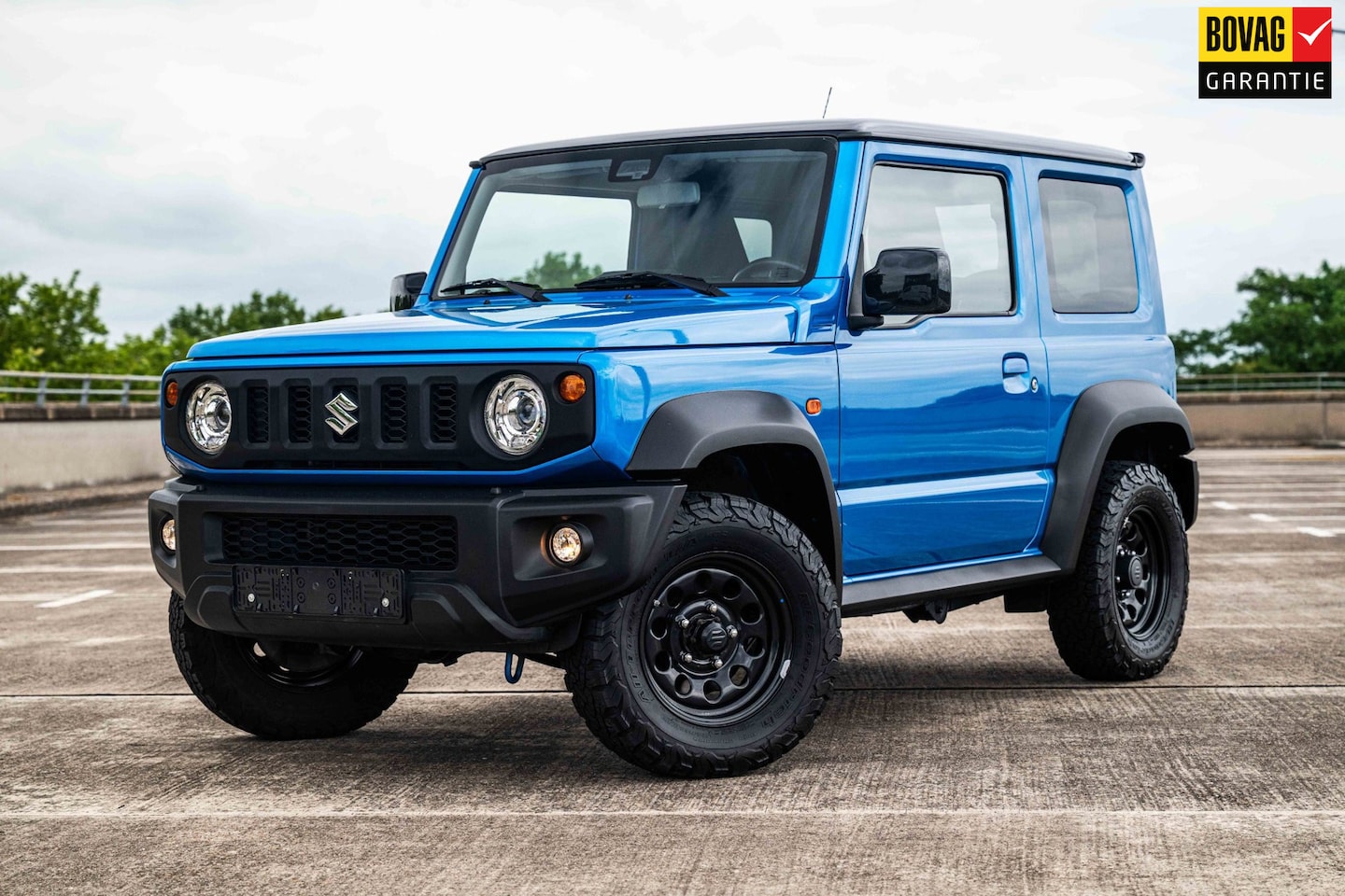 Suzuki Jimny - 1.5 Stijl | 4 Persoons | Airco/Clima | Cruise Control | Navigatie | Stoelverwarming | Trek - AutoWereld.nl