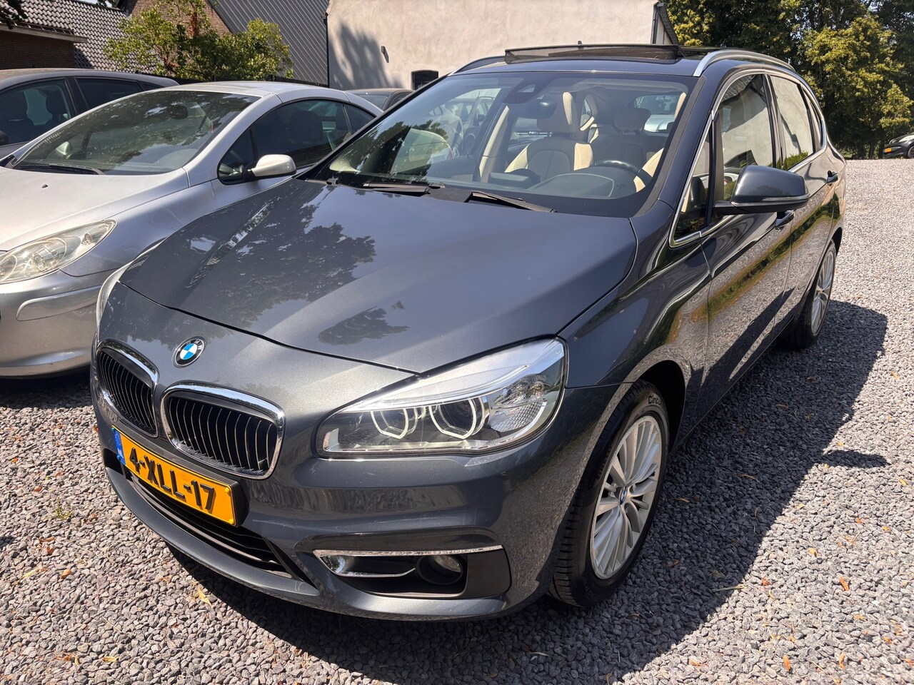 BMW 2-serie Active Tourer - 218i High Executive PANORAMADAK ALLE OPTIE,S - AutoWereld.nl