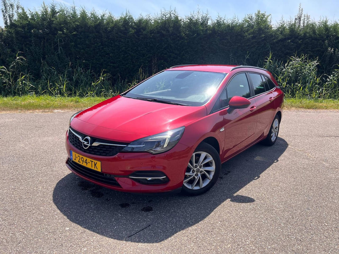 Opel Astra Sports Tourer - 1.2 SPORT ECC NAVI ARIJCAM STOEL/STUURVERWRMG - AutoWereld.nl