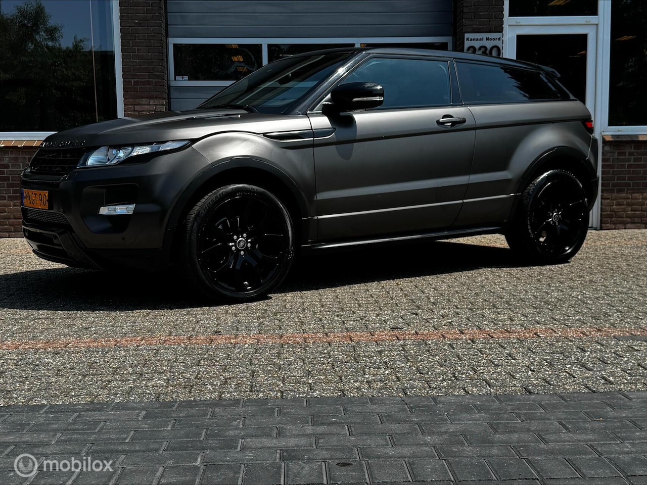 Land Rover Range Rover Evoque Coupé - 2.0 Si 4WD Dynamic VOL! - AutoWereld.nl