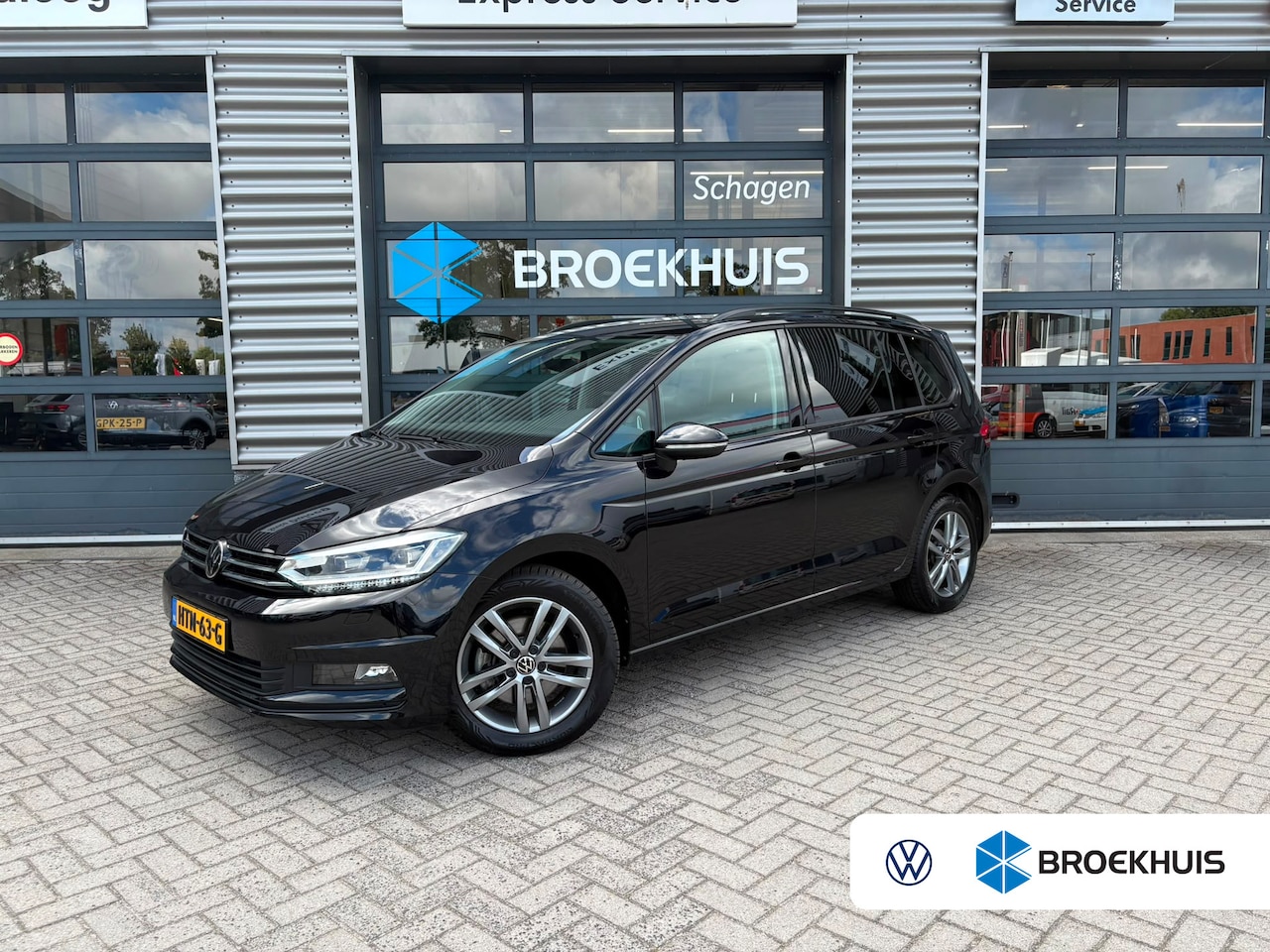 Volkswagen Touran - 1.5 TSI 150 pk Comfortline Business 7pers. 7-DSG | Achteruitrijcamera | Navigatie | Cruise - AutoWereld.nl
