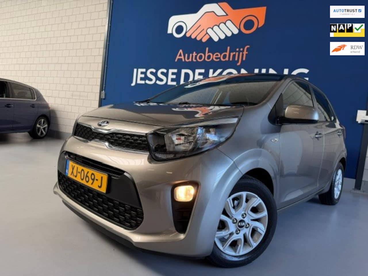 Kia Picanto - 1.0 CVVT ComfortPlusLine Navigator /bj.2019 / brons / NAP met 95587 km./ APK 02/2027 / Air - AutoWereld.nl