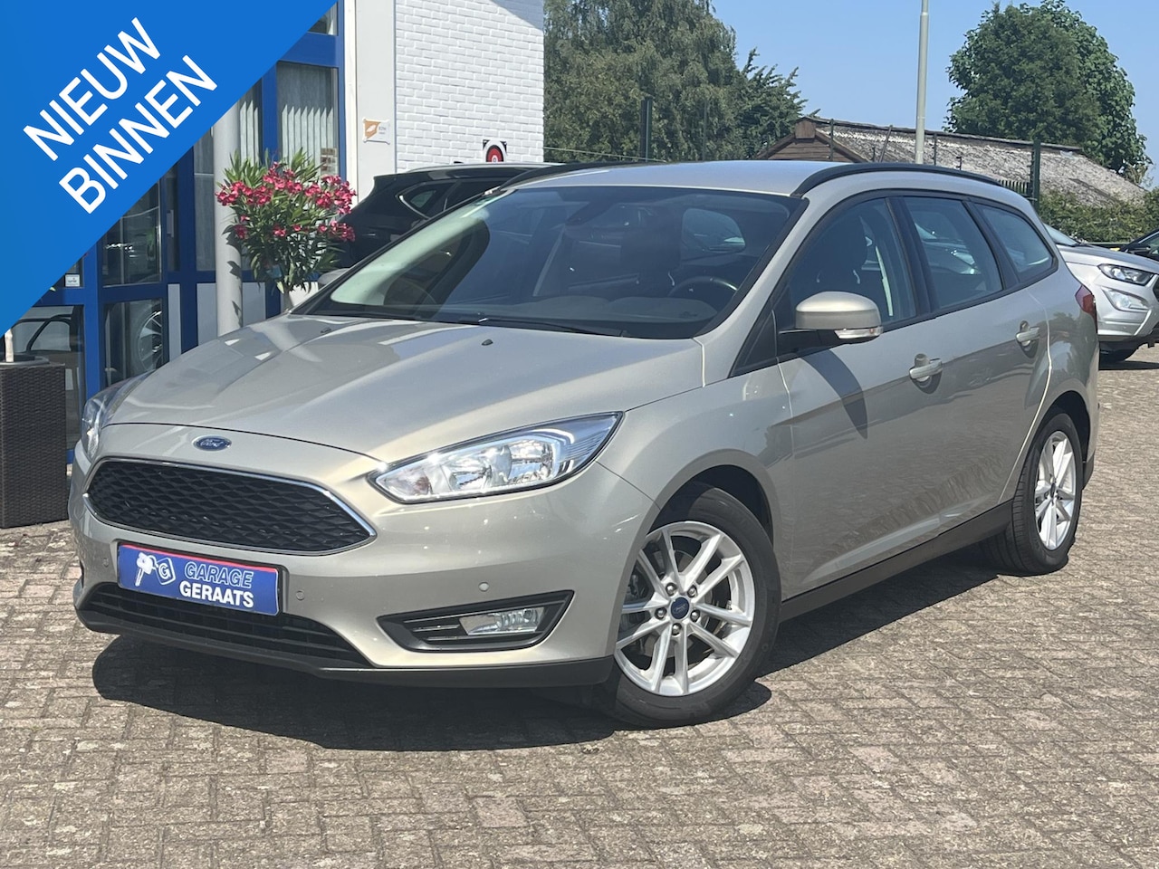 Ford Focus Wagon - 1.0 Lease Edition 1ste eigenaar, Nieuwe distributieriem, Parkeersensoren voor, Camera, Nav - AutoWereld.nl