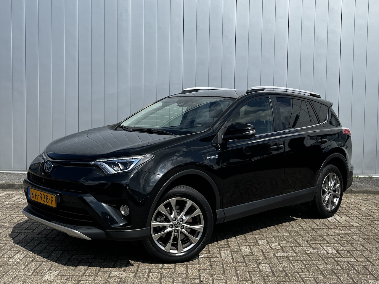 Toyota RAV4 - 2.5 Hybrid AWD Executive Business NL Auto Trekhaak 1650KG trelast Leer - AutoWereld.nl