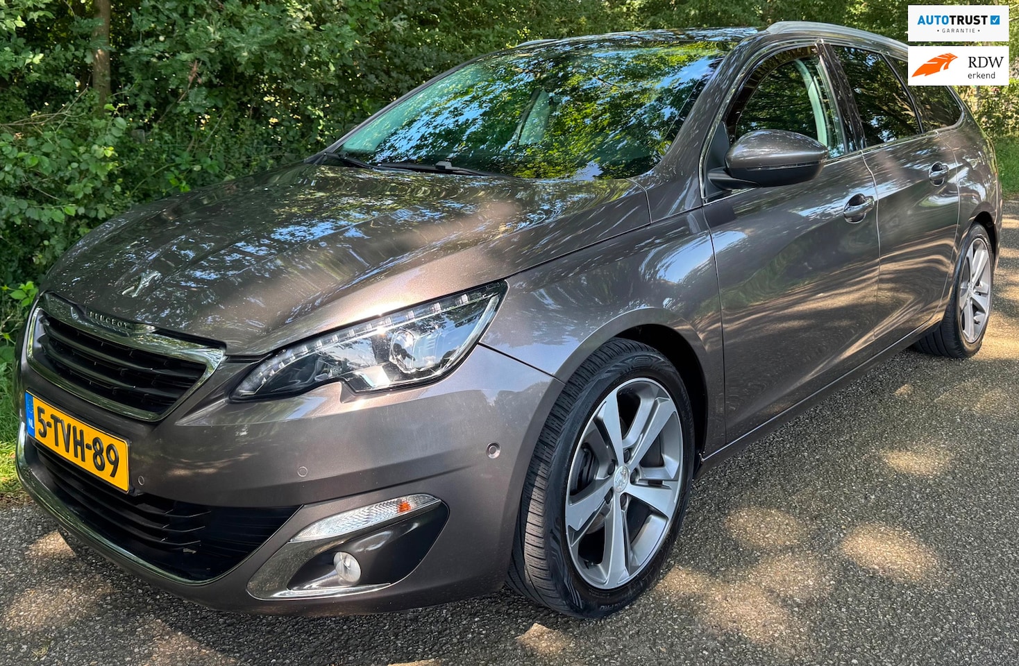Peugeot 308 SW - 1.2 e-THP Première 2014 NAP PANO CLIMA NIEUWE DISTRIBUTIERIEM - AutoWereld.nl