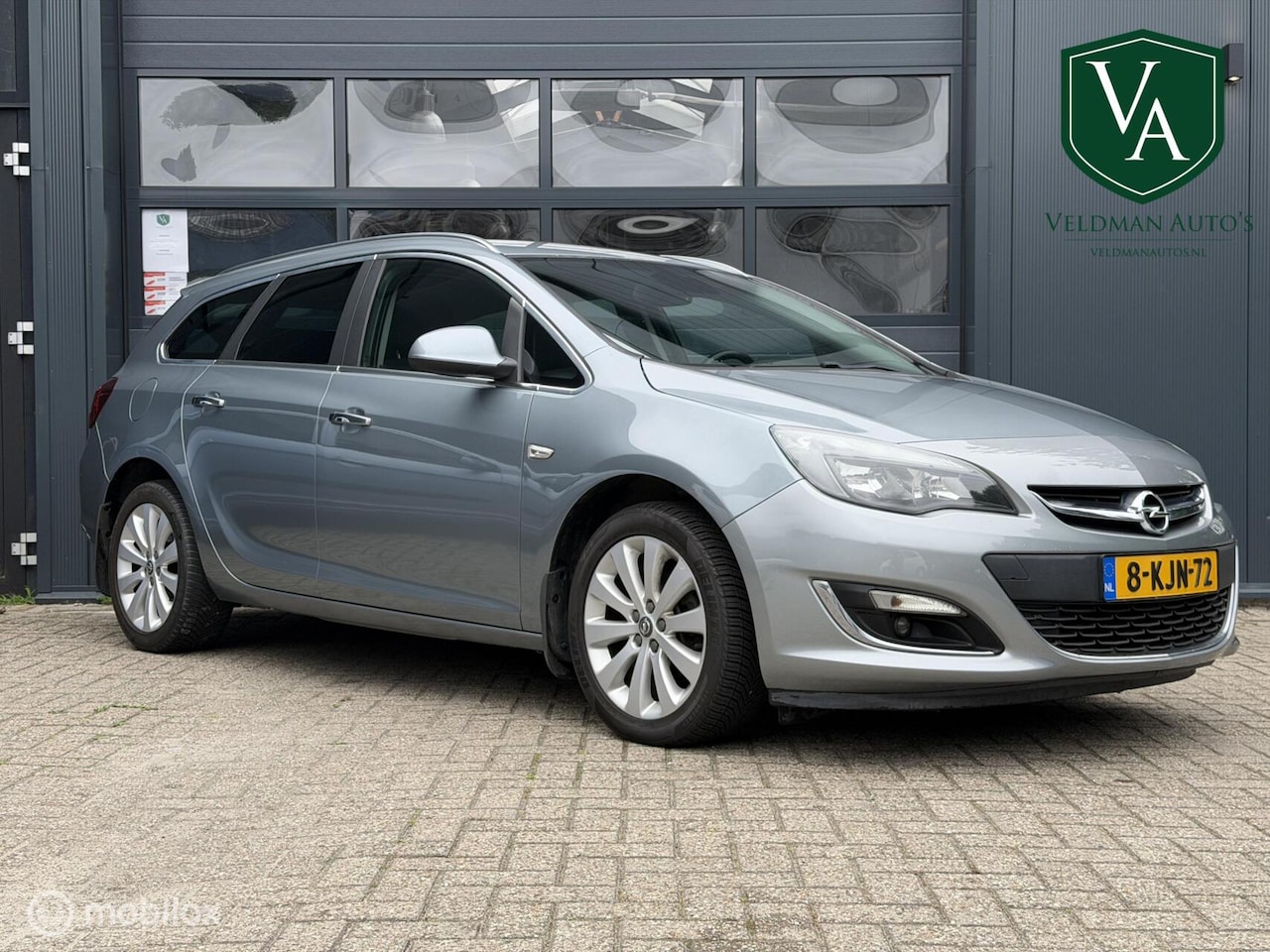 Opel Astra Sports Tourer - 1.4 Turbo | Airco | Cruise | Navi - AutoWereld.nl
