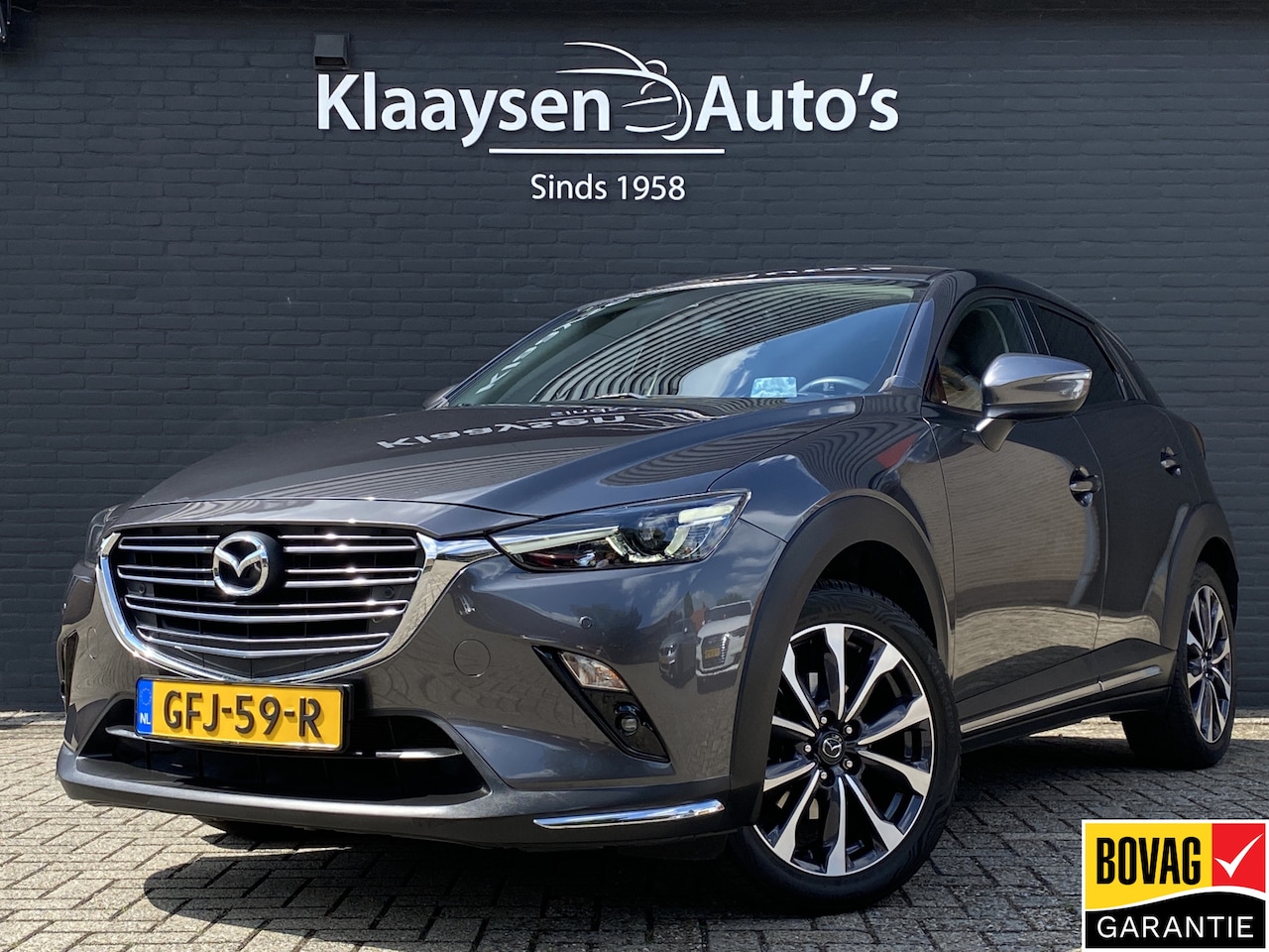 Mazda CX-3 - 2.0 SkyActiv-G 120 GT-M AUT. | navigatie | trekhaak | leder interieur | head up display | - AutoWereld.nl