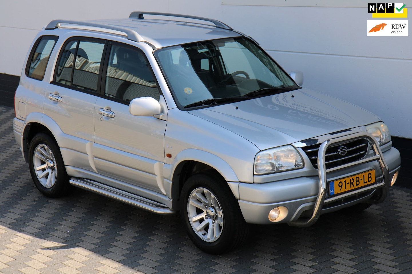 Suzuki Grand Vitara - 2.0 FreeStyle-3 4WD Airco Trekhaak NAP !! - AutoWereld.nl