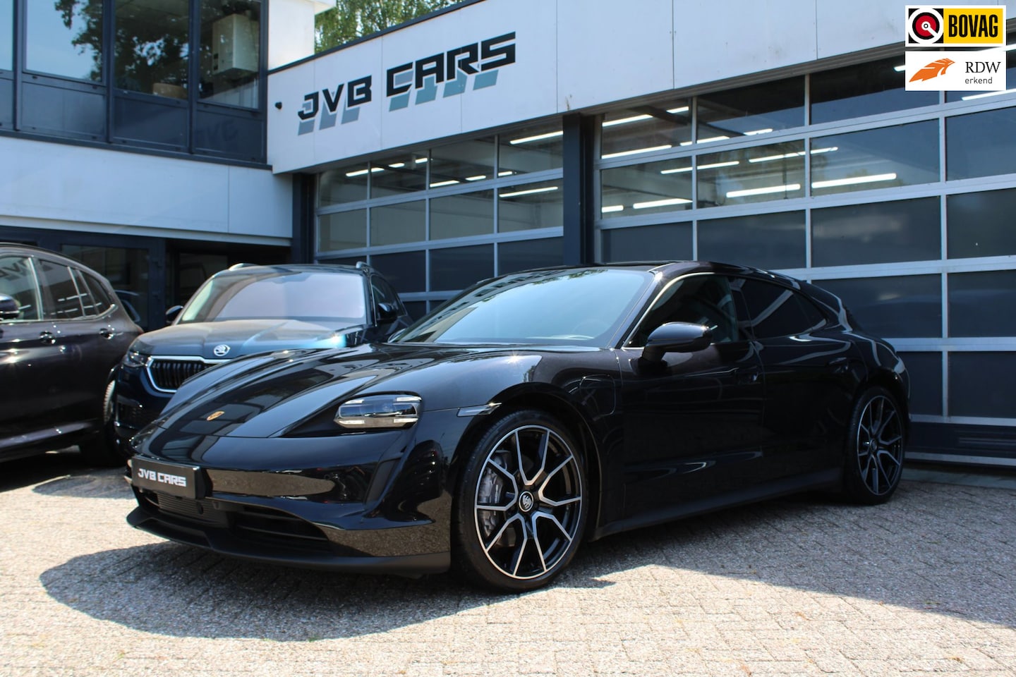 Porsche Taycan Sport Turismo - 93 kWh - AutoWereld.nl