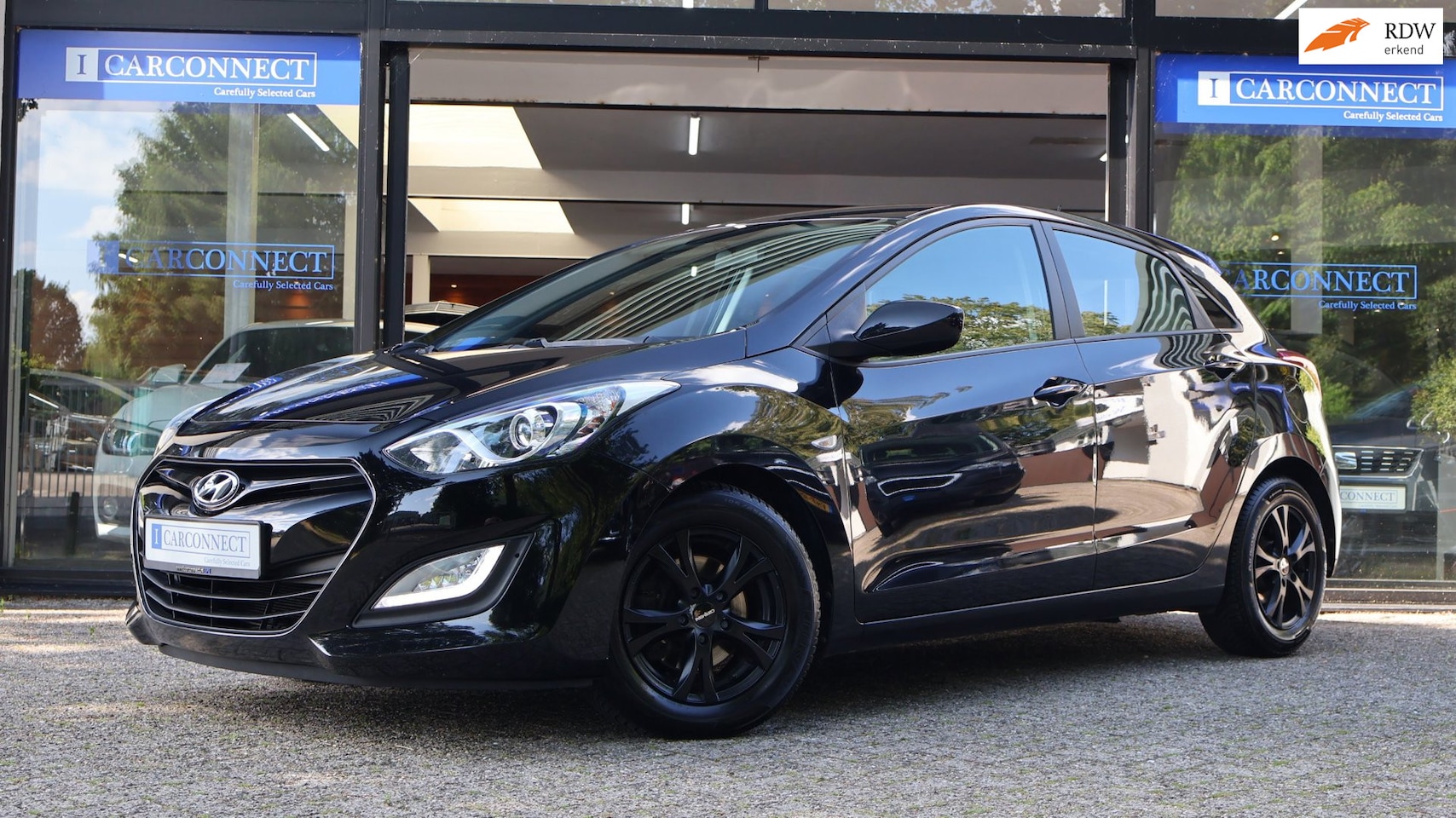 Hyundai i30 - 1.4 FIFA World Cup Edition 100pk|Clima|PDC|LED/Xenon|MF.stuur|Stl.verwarming - AutoWereld.nl