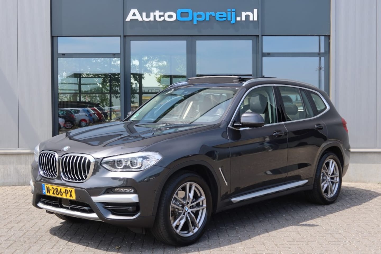 BMW X3 - 2.0i xDrive High Executive Panoramadak, Head-up, Elec. Trekhaak, Dealer onderhouden - AutoWereld.nl
