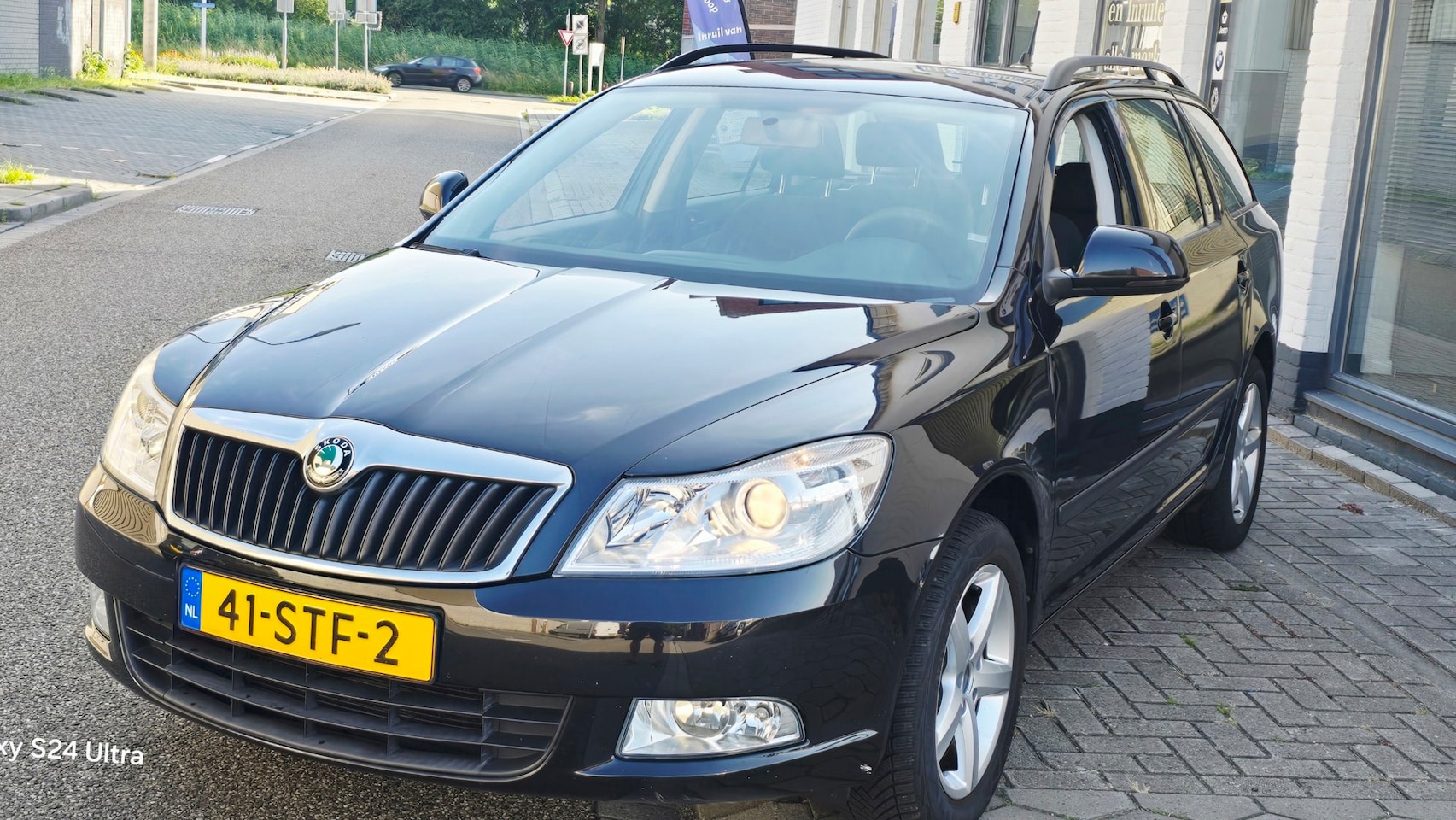 Skoda Octavia Combi - 1.2 TSI Ambition*2e eig*navi*airco*trekhaak*dealer onderhoud*nap*apk*velgen*inruil mog!!! - AutoWereld.nl