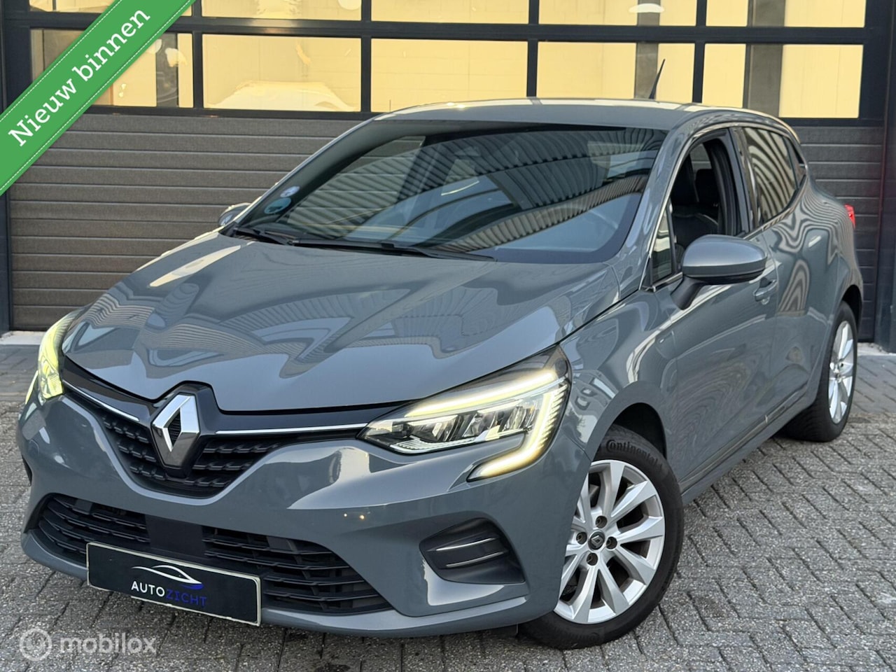 Renault Clio - 1.3 TCe Intens | Sensoren | Cruise | Automaat - AutoWereld.nl