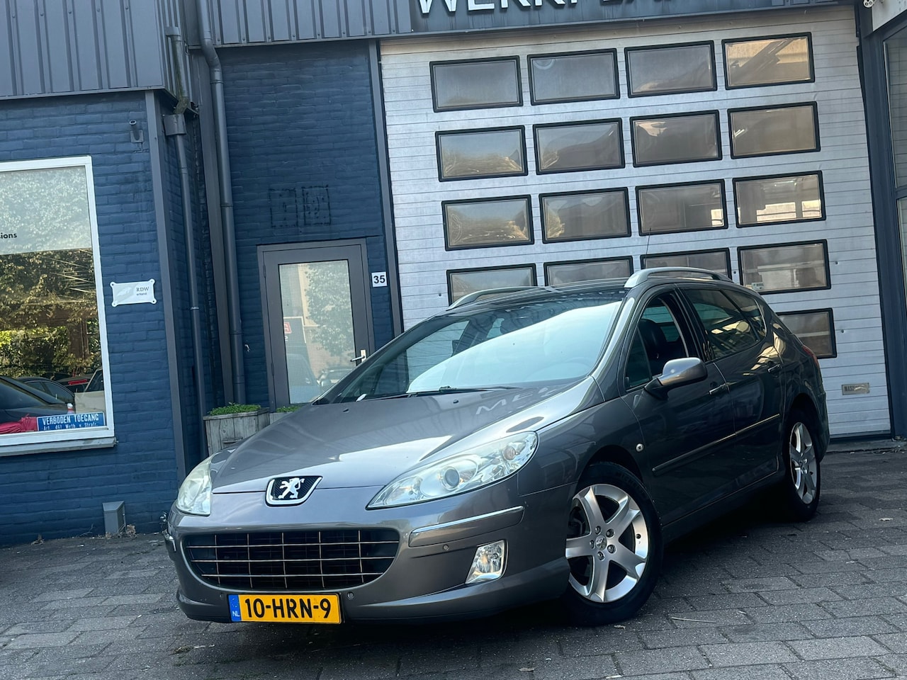 Peugeot 407 SW - 2.0 ST Pack Business Intro | Clima | Navi | Pano | Leer - AutoWereld.nl