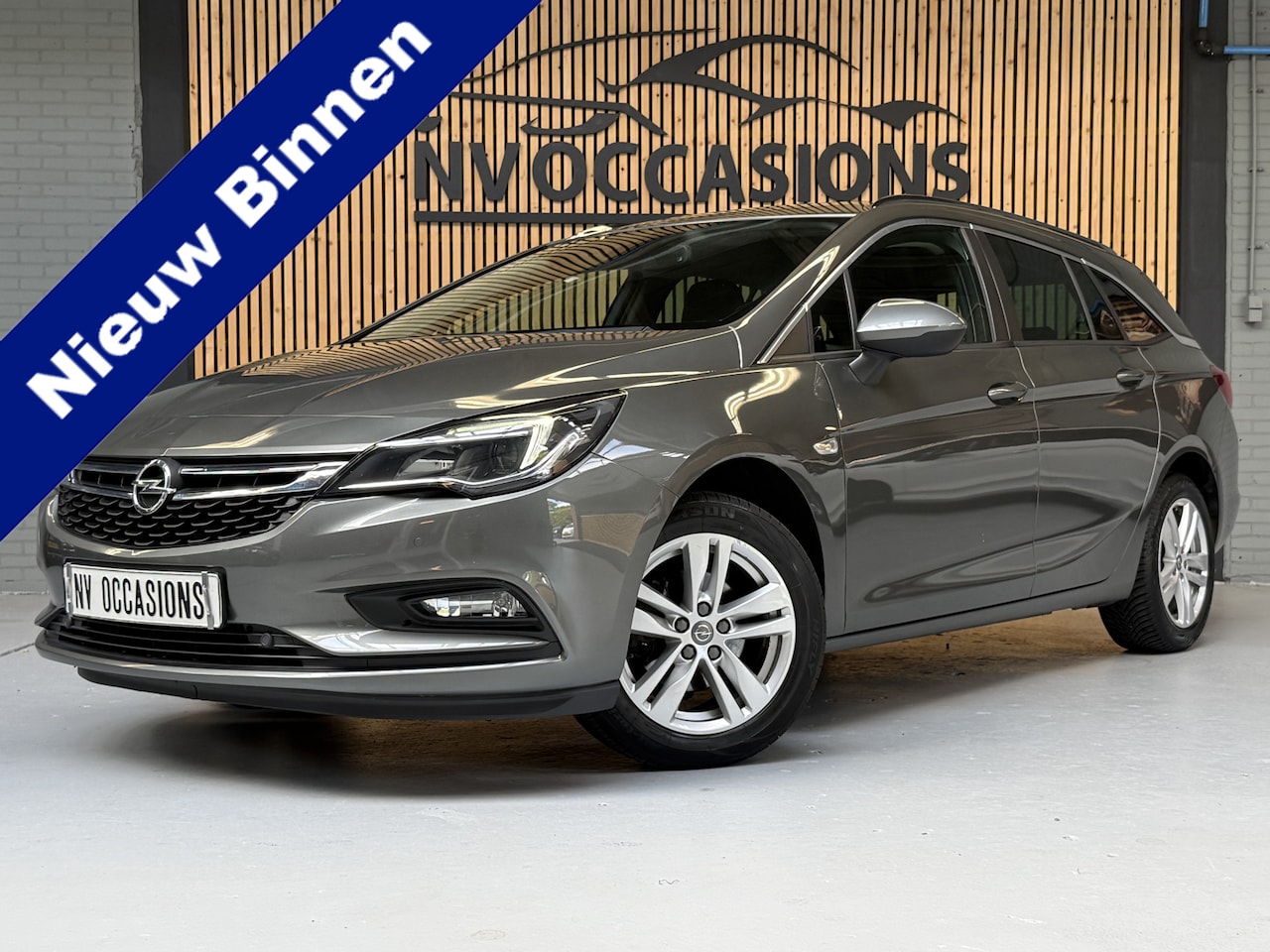 Opel Astra Sports Tourer - 1.4 Turbo Online Edition 150PK/STOEL/STUURVW/NAP/PDC/AFN-TREKHAAK! - AutoWereld.nl