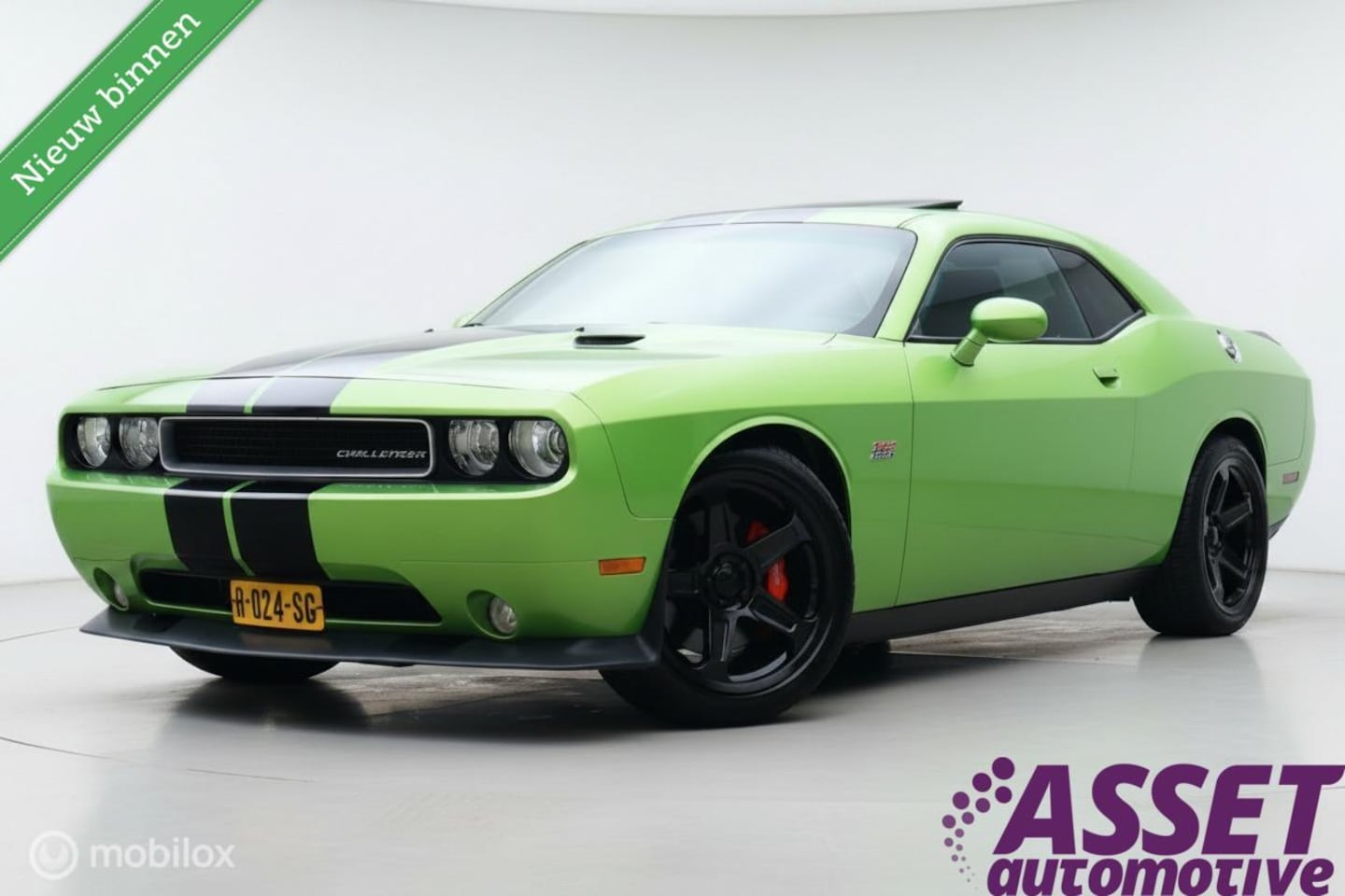 Dodge Challenger - SRT8 6.4 V8 aut 470 pk| schuifdak | mooi! - AutoWereld.nl