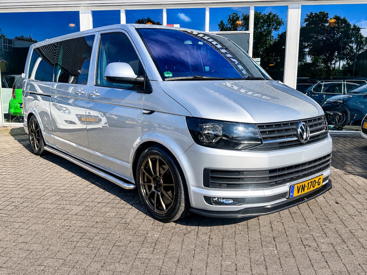 Volkswagen Transporter Caravelle - 2.0 TDI L2H1 Highline/Dc/6 persoons/Marge/Luxe Uitvoering!!! - AutoWereld.nl