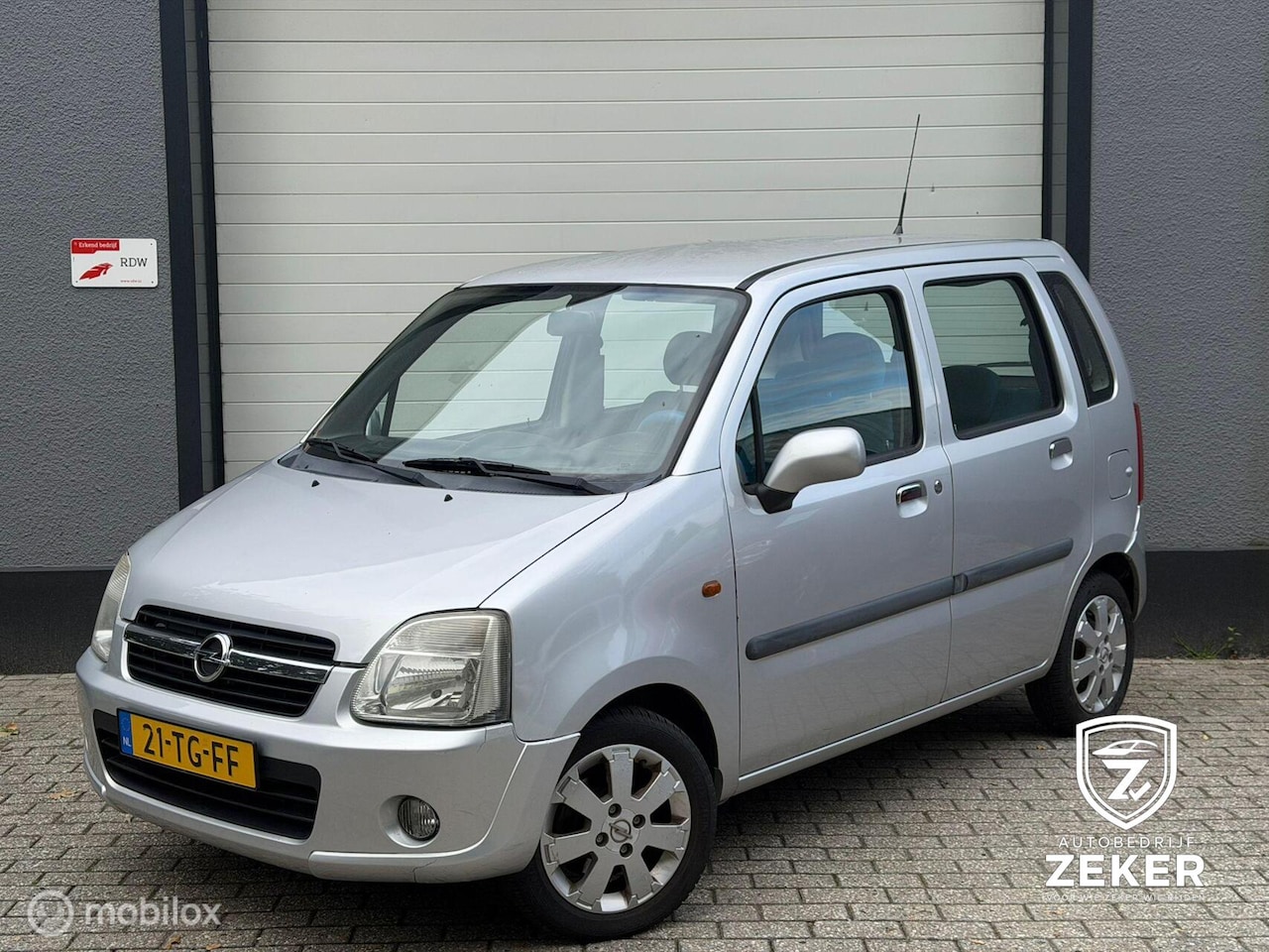 Opel Agila - 1.2-16V Flexx cool / airco / nap / lange apk - AutoWereld.nl