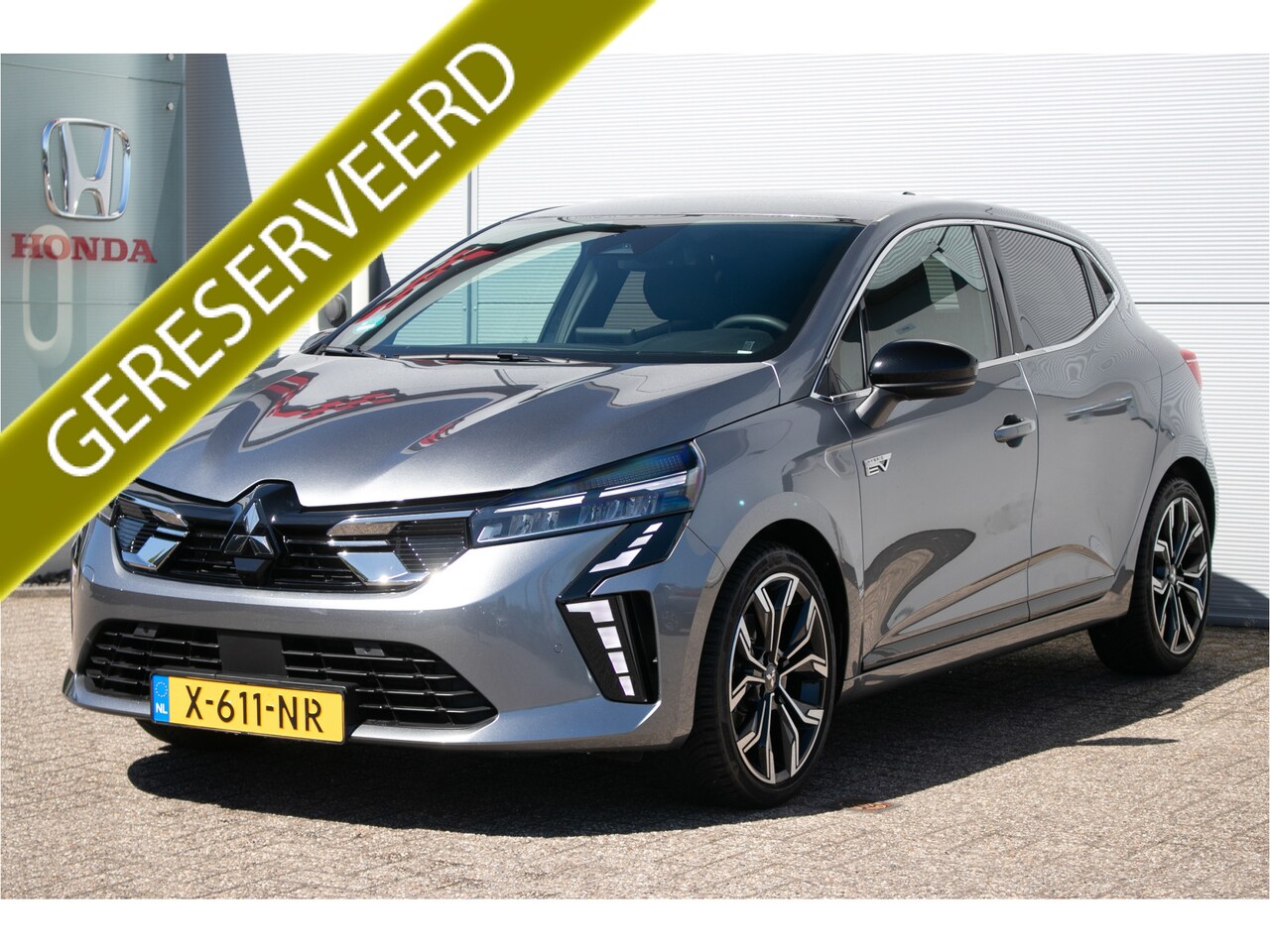 Mitsubishi Colt - 1.6 HEV First Edition - 1e eig. | Dealer onderh. | Carplay | Stoel+stuurverw. - AutoWereld.nl