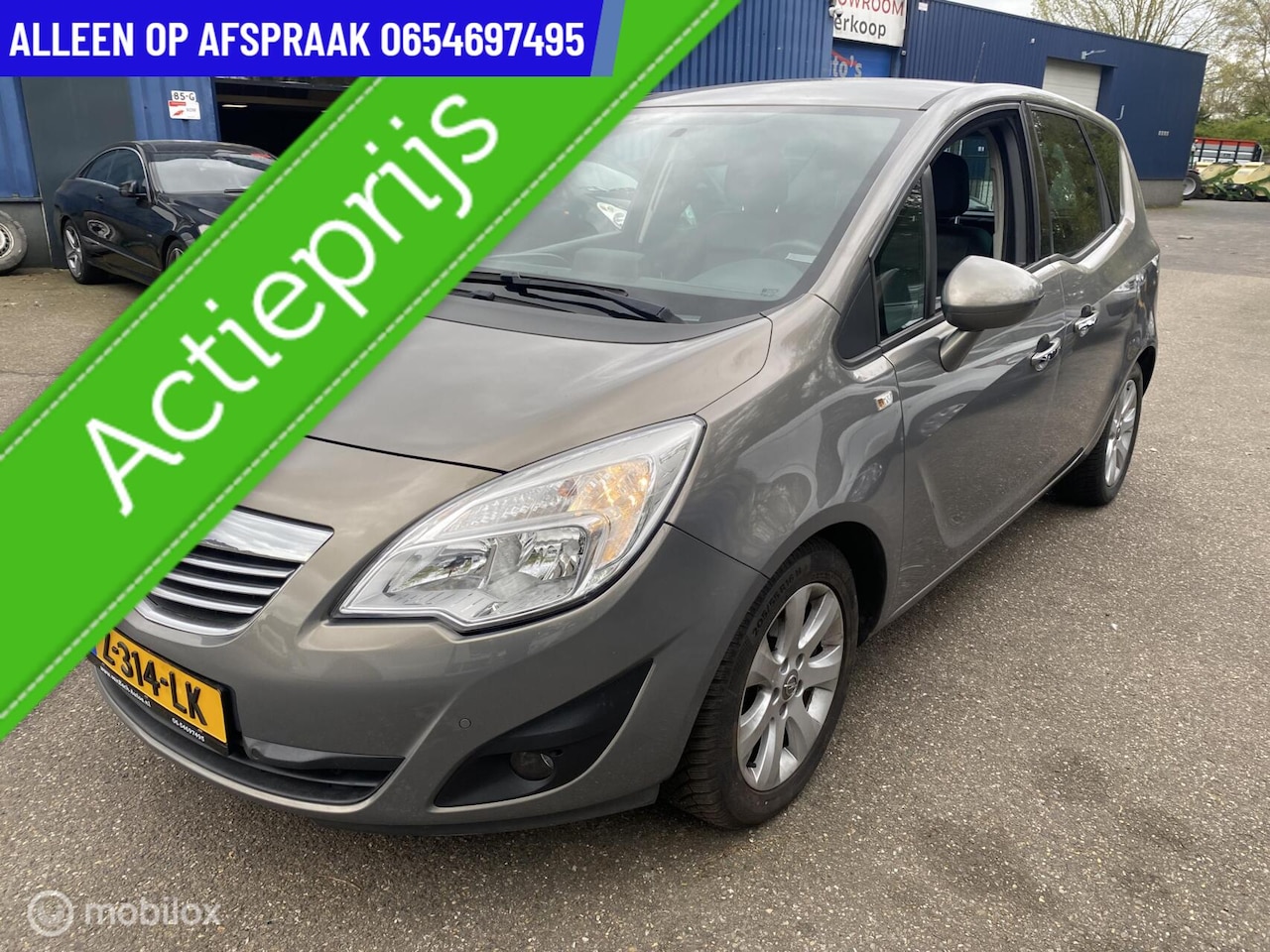 Opel Meriva - 1.4 Cosmo 93.DKM STOEL/STUUR VERW ECC NAVI PDC CRUISE LEDER - AutoWereld.nl