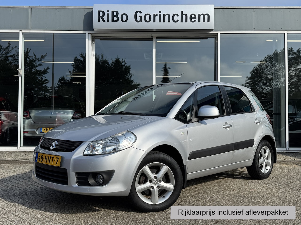 Suzuki SX4 - 1.6 Exclusive * Trekhaak * Airco * - AutoWereld.nl