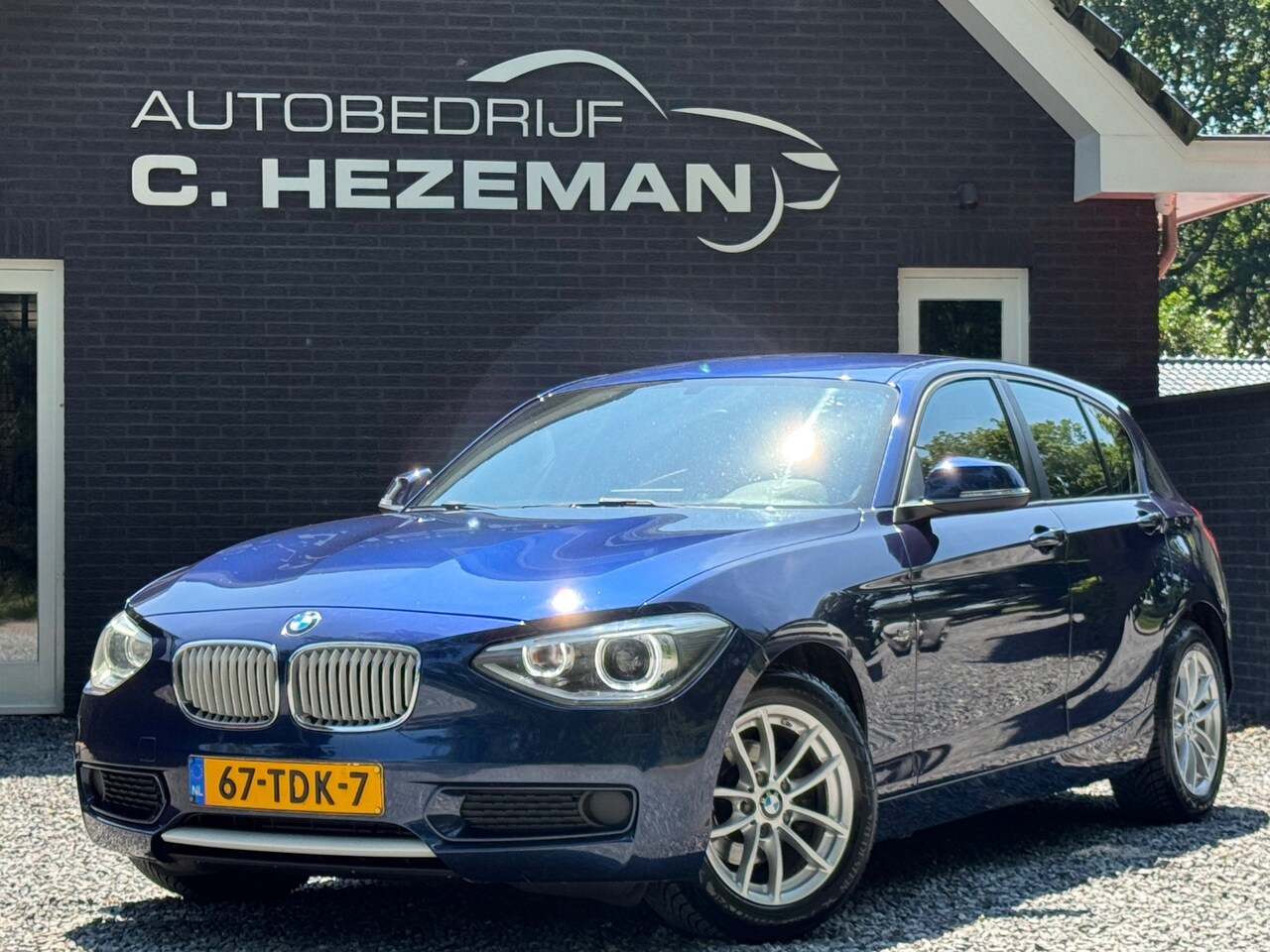 BMW 1-serie - 116i URBAN LED XENON Navigatie Groot Sport interieur LEDER - AutoWereld.nl