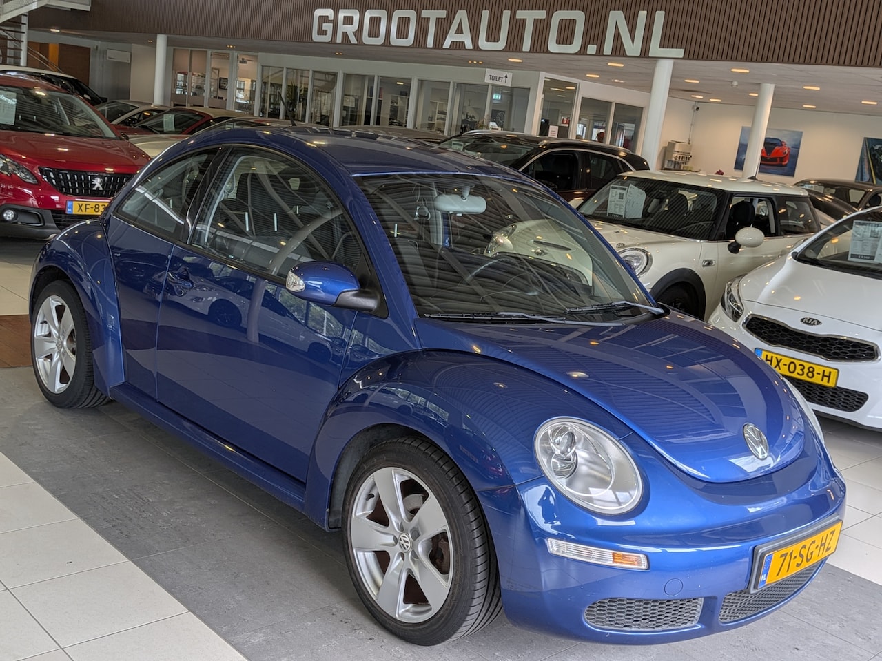 Volkswagen New Beetle - 2.0 Highline Cruise Control, Airco, Stuurbekrachtiging - AutoWereld.nl