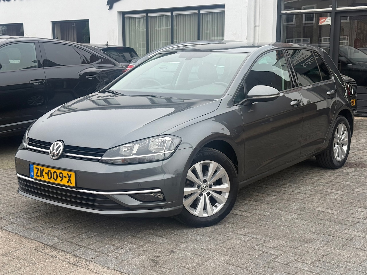 Volkswagen Golf - 1.0 TSI Comfortline Business 1.0 TSI Comfortline Business, Apple Carplay/Android,Navigatie,L.M.Velgen - AutoWereld.nl